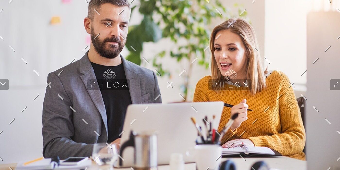 demo-attachment-1150-two-business-people-with-wheelchair-in-the-office-P7XLSBC