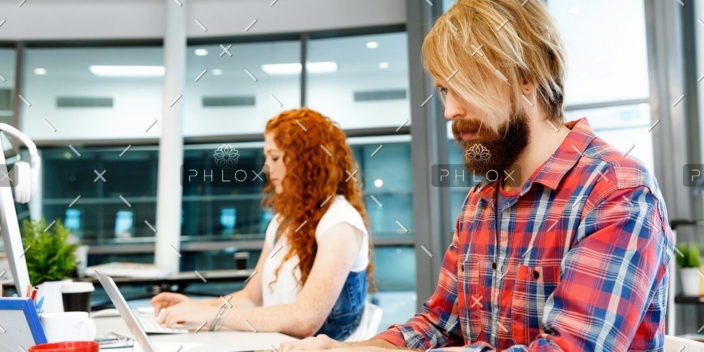 demo-attachment-1149-two-co-workers-working-together-PPVW2LA