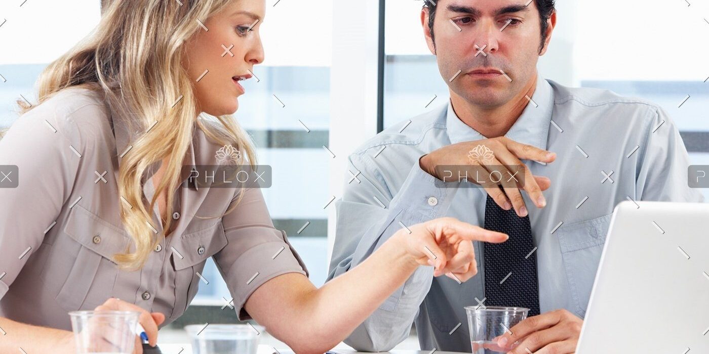 demo-attachment-1152-businessman-and-businesswoman-meeting-in-office-PZZXTMB